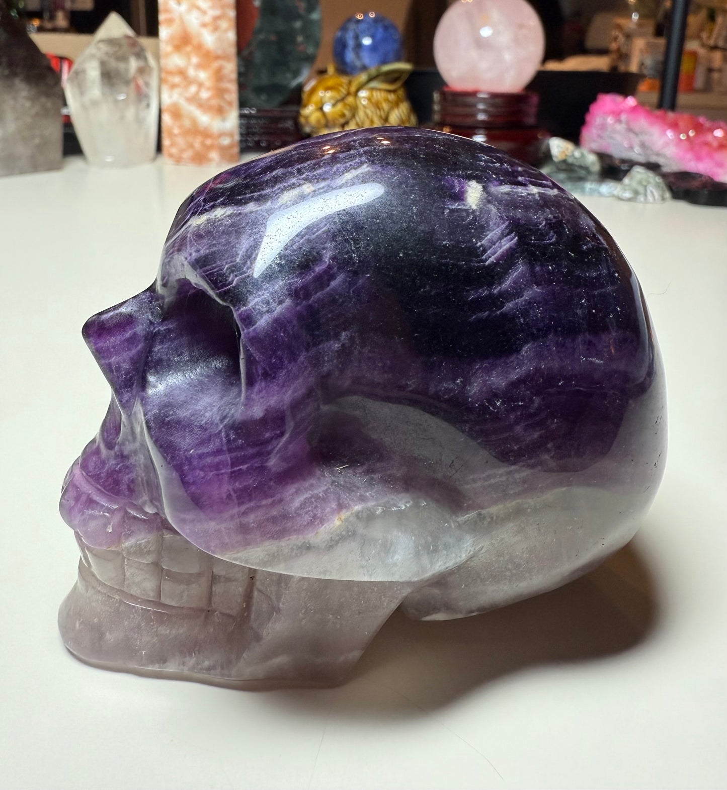 Purple candy fluorite carved skull