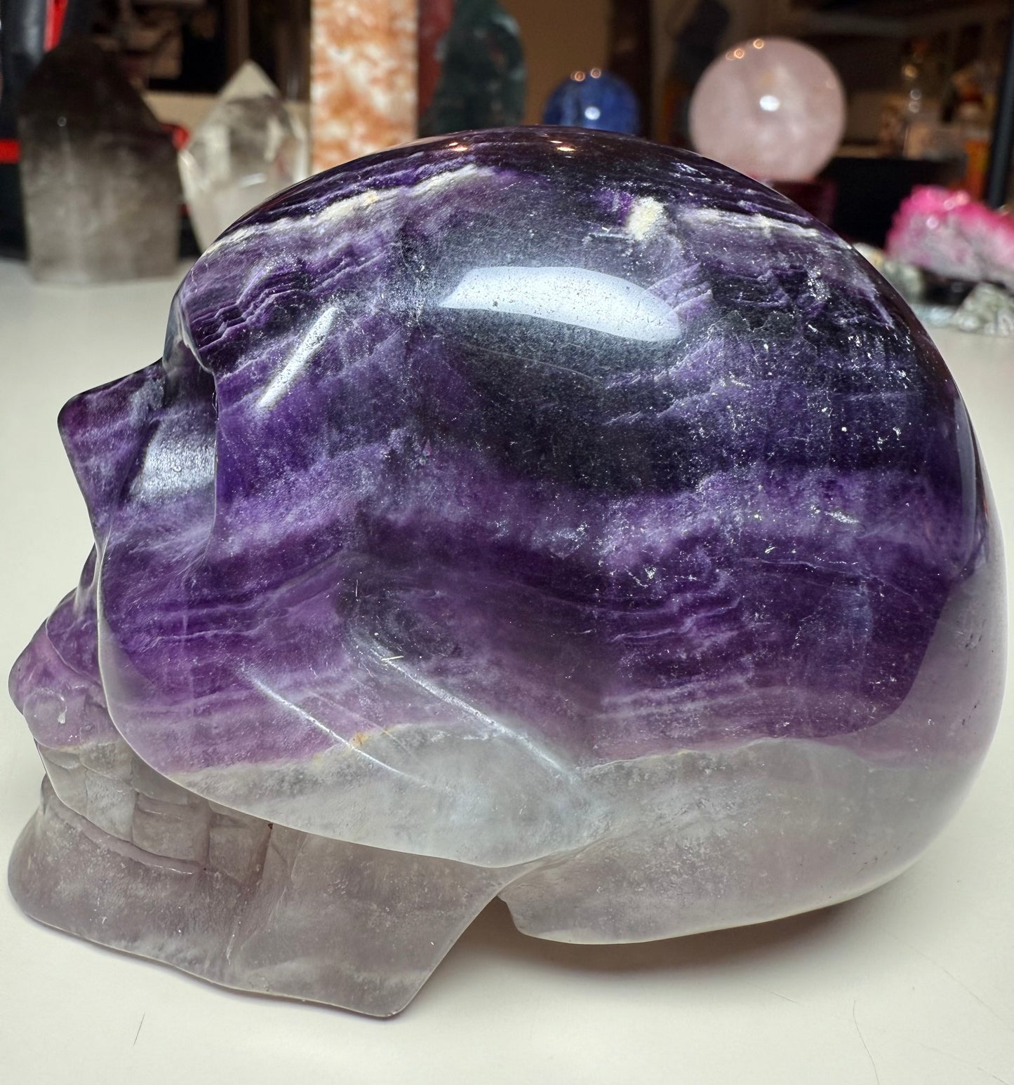 Purple candy fluorite carved skull